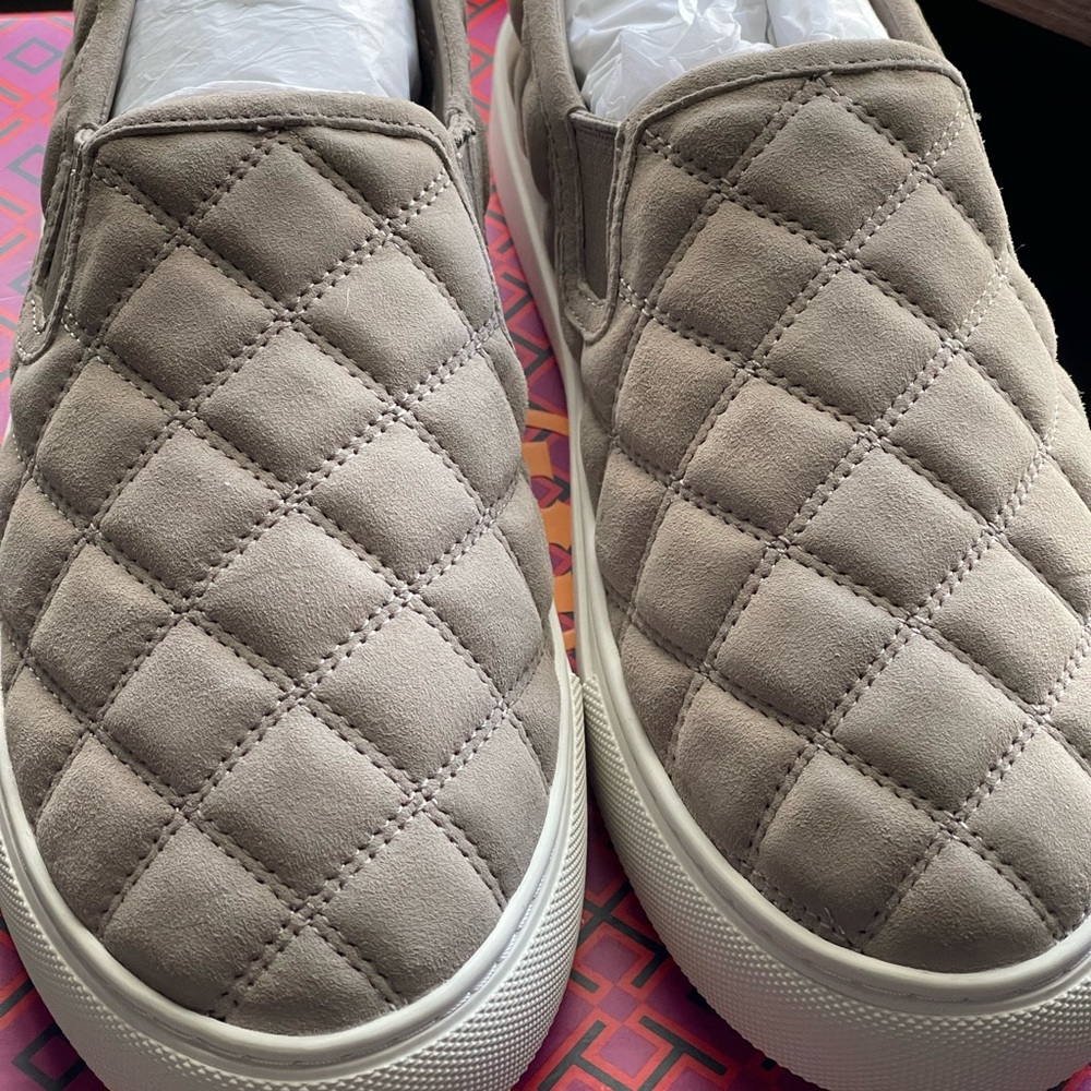 Tory Burch Slip Ons. Brand new. Still in box.